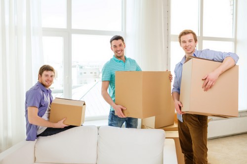 Packed office furniture and equipment ready for a business move
