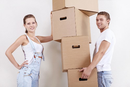 Prepared moving boxes and labelled rooms for a Temple house move